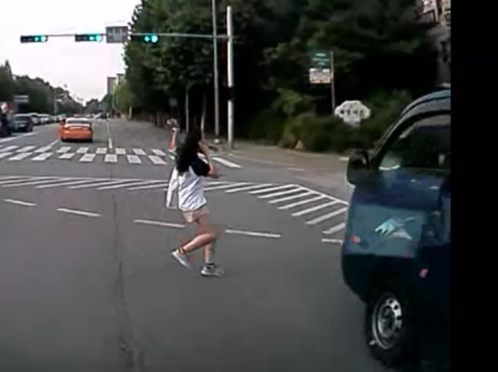 Narrow Miss For Cell Phone Talking Pedestrian (Video)