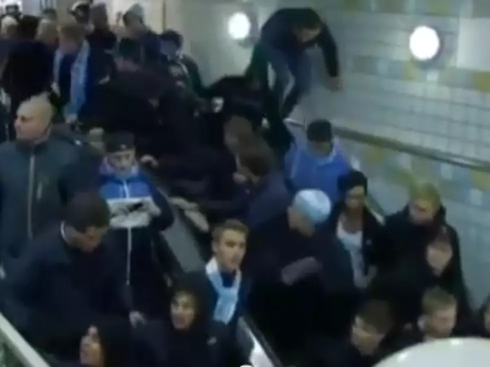 Malfunctioning Escalator Breaks Up Fan Brawl At Soccer Match (Video)