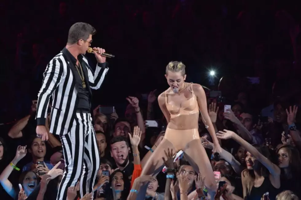 A Photo Collection of Miley Cyrus Making Weird Faces at the VMAs