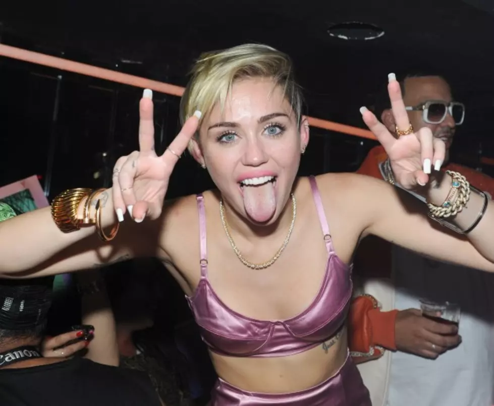 15 Best Pictures of Miley Cyrus Sticking Out Her Tongue