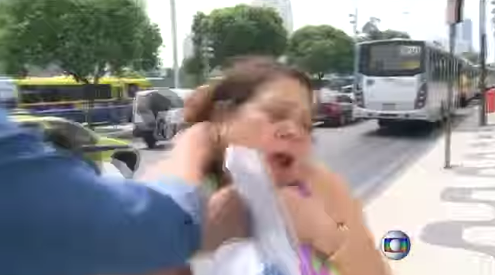 Woman Gets Mugged During Interview [VIDEo]