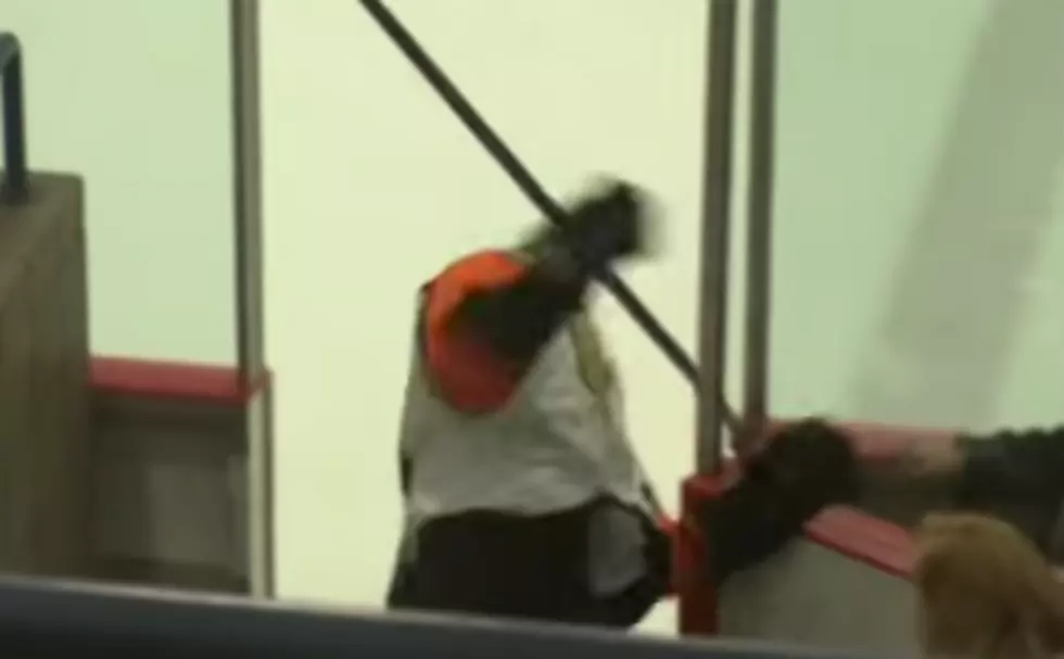 Hockey Player Accidentally Clotheslined Himself With His Own Stick [VIDEO]