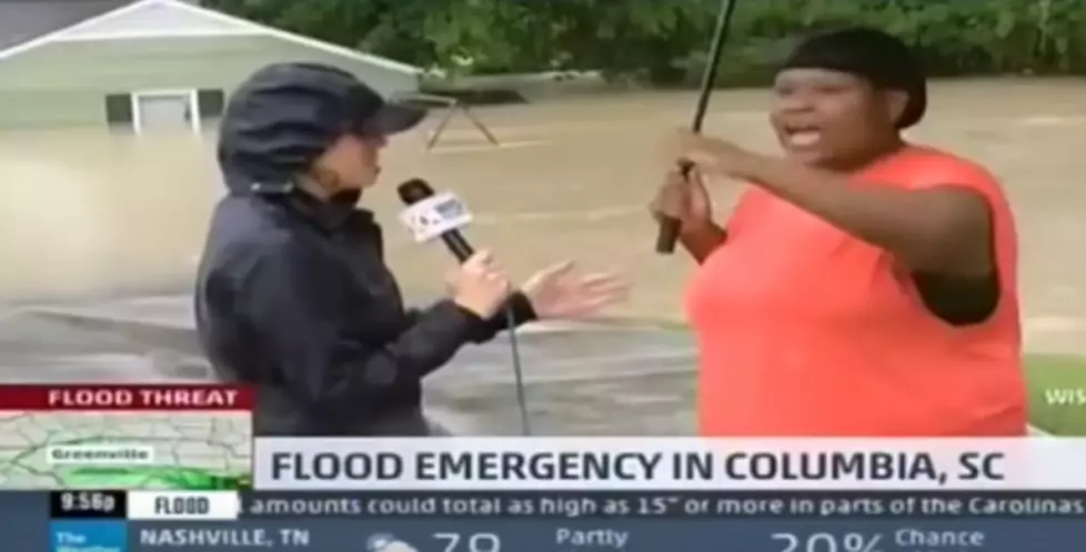 South Carolina Woman Rescues Dog and Pizza From Flooded Apartment (VIDEO)