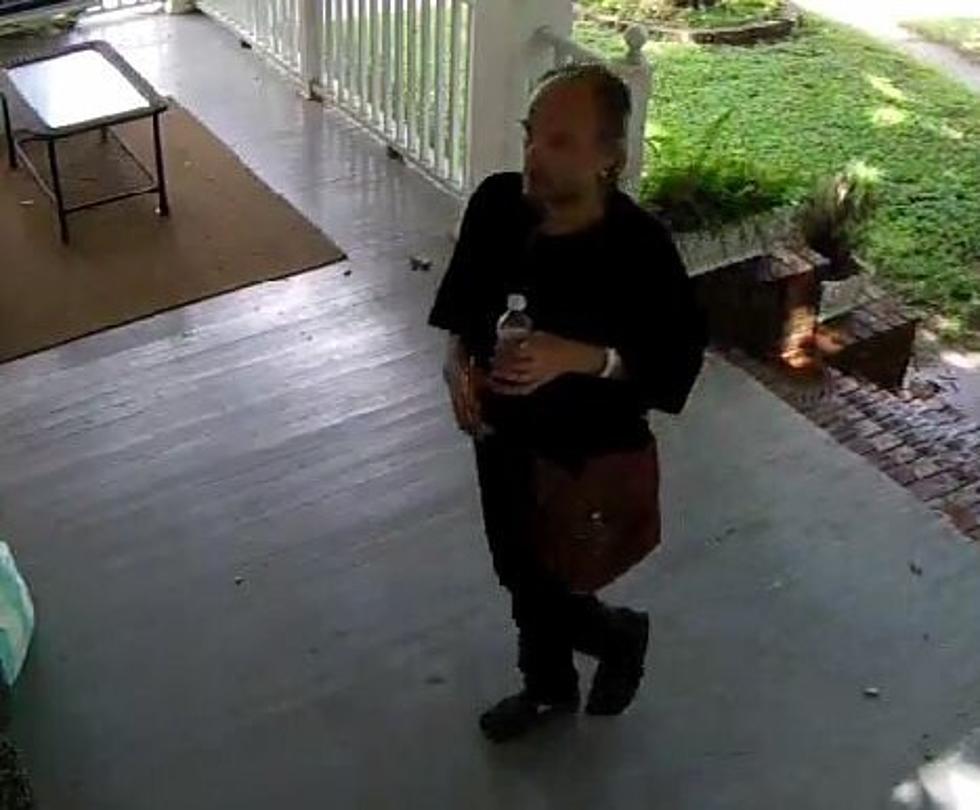 Who Is the Man with the Brown Satchel Asking for Help in Highland Neighborhood?