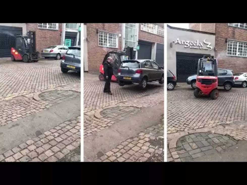 Forklift Removes Car From Blocked Driveway [VIDEO]