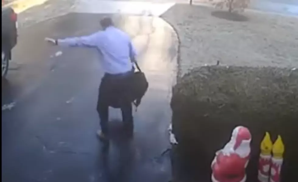 Poor Guy Slips and SLides All the way Down Driveway [VIDEO]