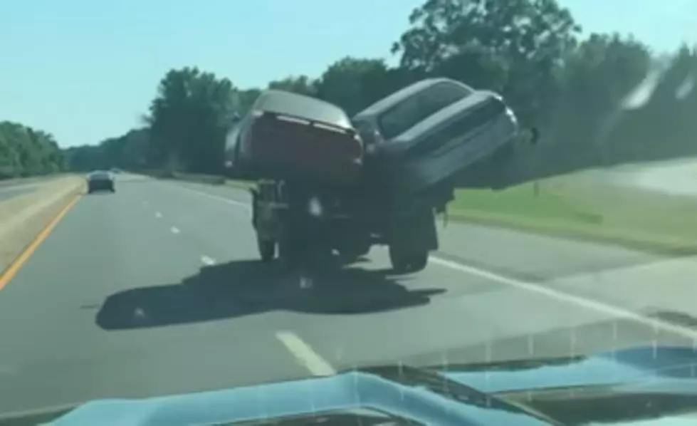 Arkansas Truck Seen Carrying Two Cars in it’s Bed [VIDEO]