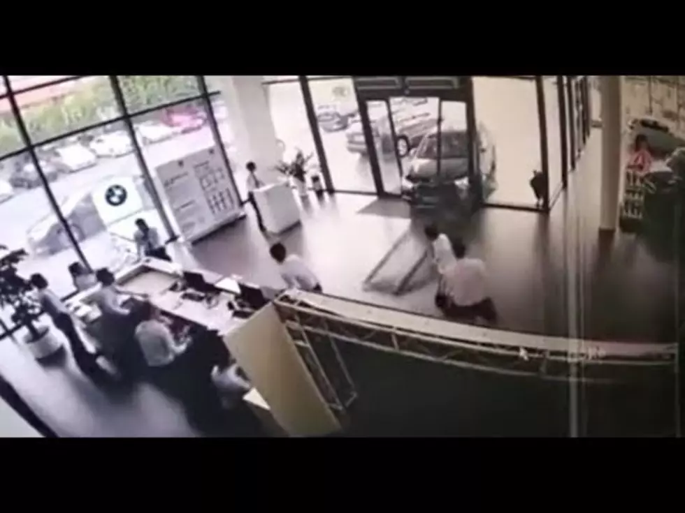 Woman Crashes Car Into Dealership During Test Drive [VIDEO]