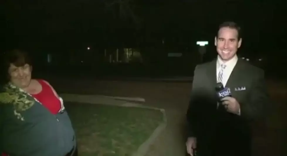Crazy Woman Hassles TV Reporter During His Live Report [VIDEO]