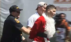 VIDEO: Santa Gets Tackled For Interrupting The Longhorns Game In Austin