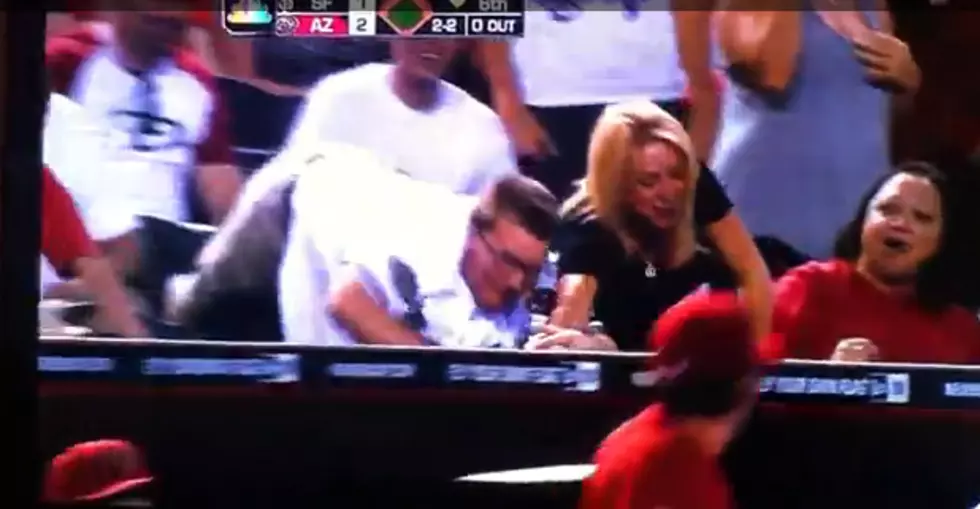 Dude Fights Woman Over Foul Ball [VIDEO]