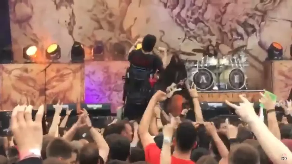 Heavy Metal Fans Help Man in Wheelchair Crowd Surf