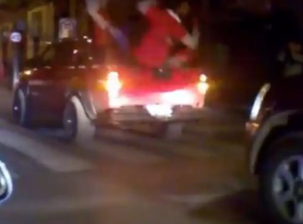 Watch a Bunch of Soccer Fans Fall Off the Back of a Moving Truck [VIDEO]