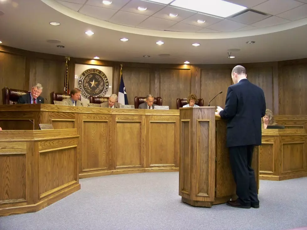 Commissioners Table Redistricting Plans