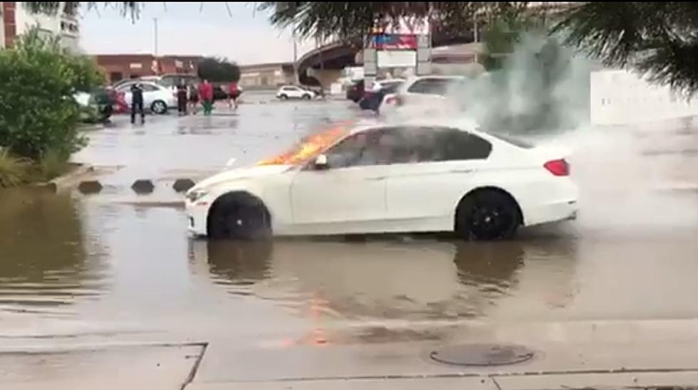 Bizarre Video of Car on Fire in Flooded Lubbock, Texas Street Goes Viral