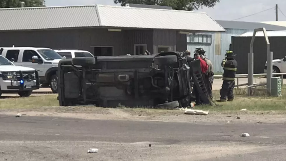 One Person Trapped in Car After Rollover Crash