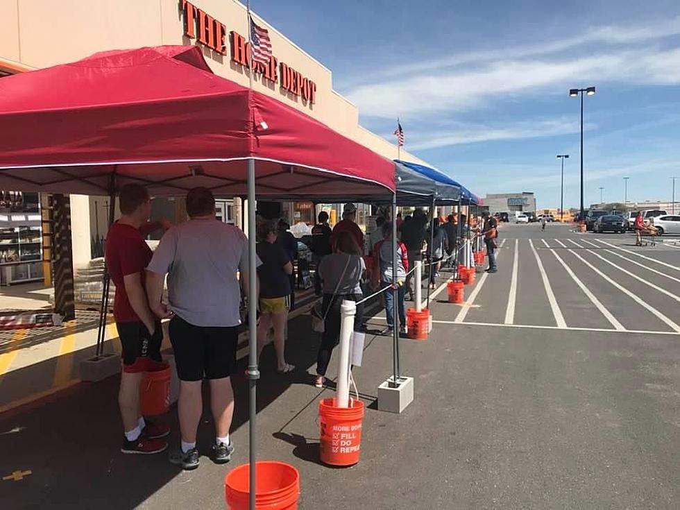 Customers Practice Social Distancing at a Home Depot