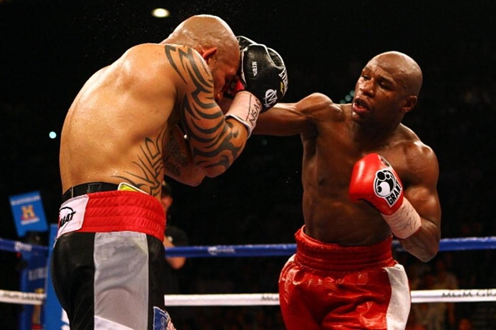Floyd Mayweather  Jr. Wins Unanimous Decision Over Miguel Cotto