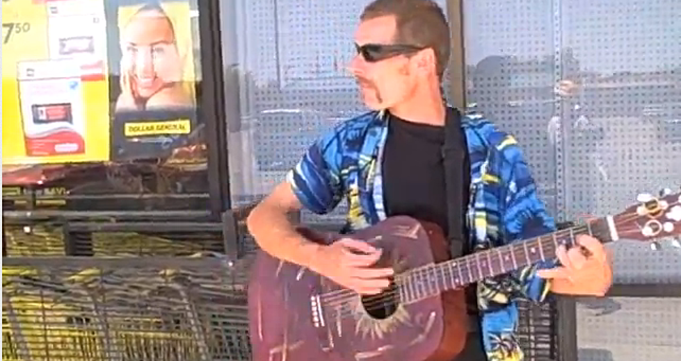 Local Man Performs In Front Of Dollar General To Make A Dollar