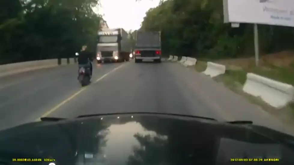Woman Falls Asleep On Scooter – Narrowly Avoids Death [VIDEO]