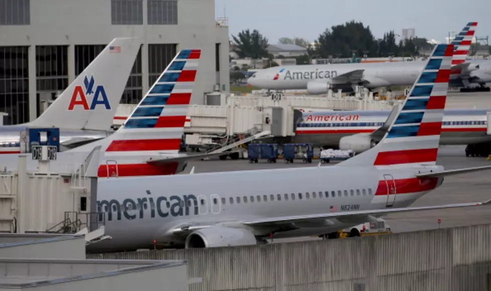 American And US Airways Change Fees And Mileage Rules