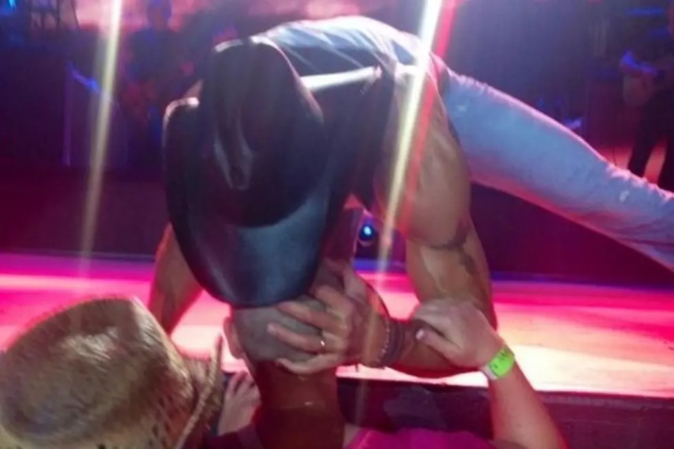 Tim McGraw Empowers Fan Fighting Cancer With Heartfelt Kiss