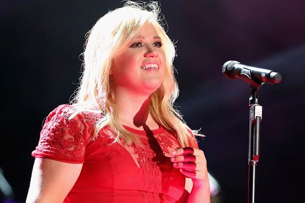 Kelly Clarkson and Family Get Wrapped in Red in Christmas Photo