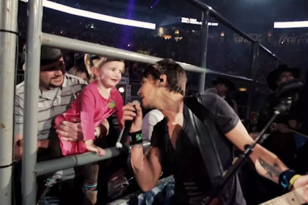 Keith Urban Plants One on Adorable Girl While Singing ‘Kiss a Girl’ [Watch]