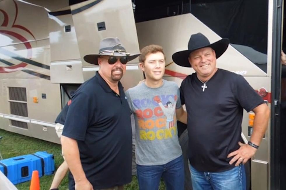 John Michael Montgomery Requests a Photo With Scotty McCreery at Countryfest [Watch]