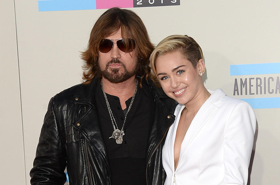 Billy Ray Cyrus Says Daughter Miley Reminds Him Of A Mixture Of Dolly And Lucille Ball. Dolly Smiles, Lucy Spins In Grave