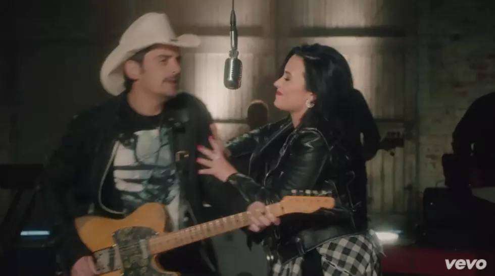 Brad Paisley, Demi Lovato Duke It Out in ‘Without a Fight’ Video