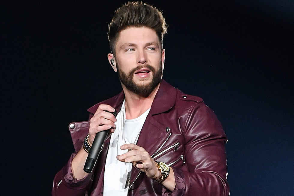 Chris Lane’s First-Ever Stage Fall Wasn’t Graceful, But He Recovered [Watch]