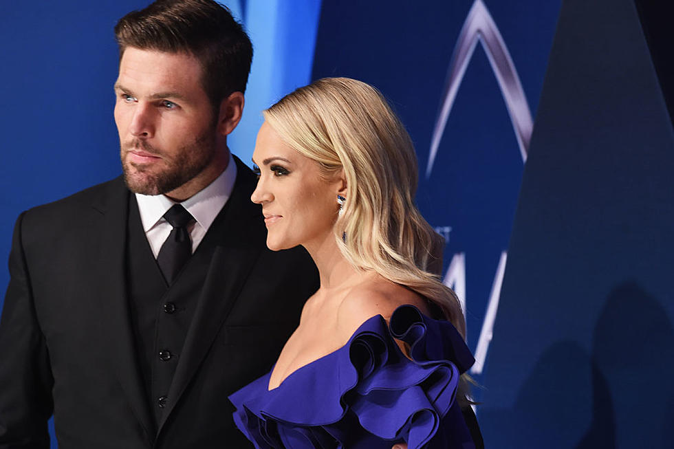 9 Times Mike Fisher Put Carrie Underwood on a Pedestal