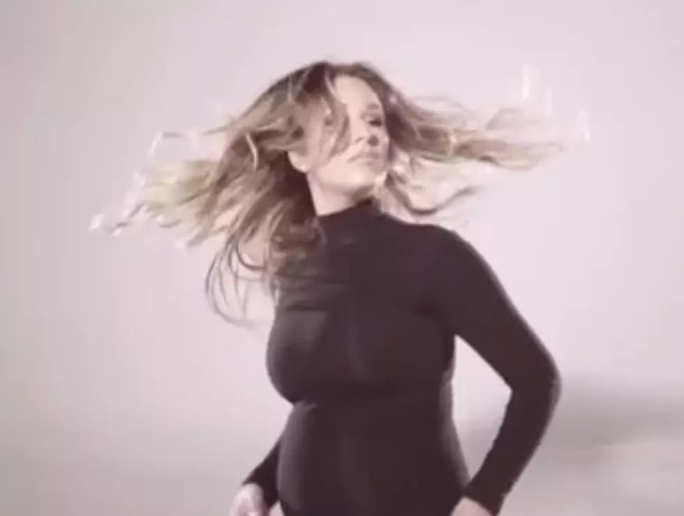 Jessie James Decker Owns Pregnancy in Fun 'Flip My Hair' Video