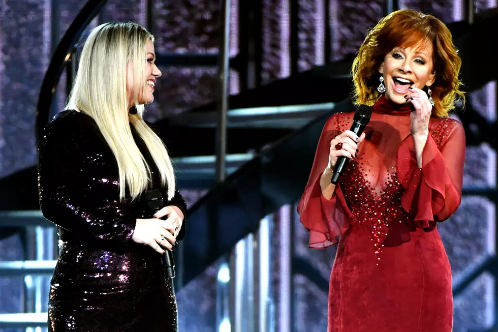 Reba McEntire Puts on Famous Low-Cut Red Dress for &#8216;Does He Love You&#8217; at 2018 ACMs