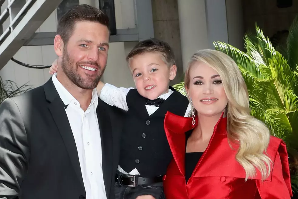 Carrie Underwood + Family Wear Matching Onesies for Precious Christmas Greeting