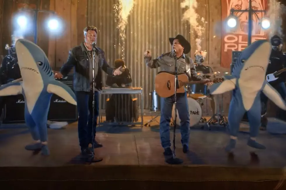 Garth Brooks, Blake Shelton Head to the Bottom of a Whiskey Bottle for ‘Dive Bar’ Video [Watch]