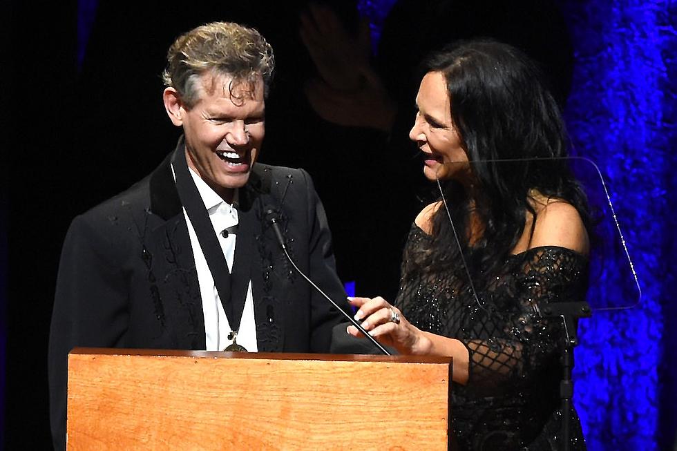 Randy Travis Surprises His Wife, Mary, With Flowers for Mother’s Day [Watch]