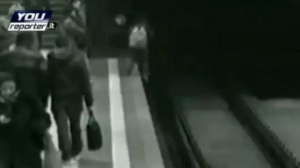 Kid Falls Onto Subway Tracks While Playing Video Game