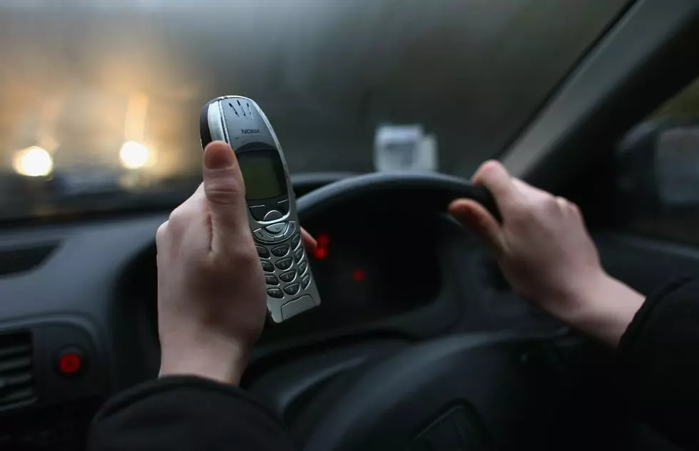 Should There Be a Law Against Using a Phone While Driving? — Survey of the Day