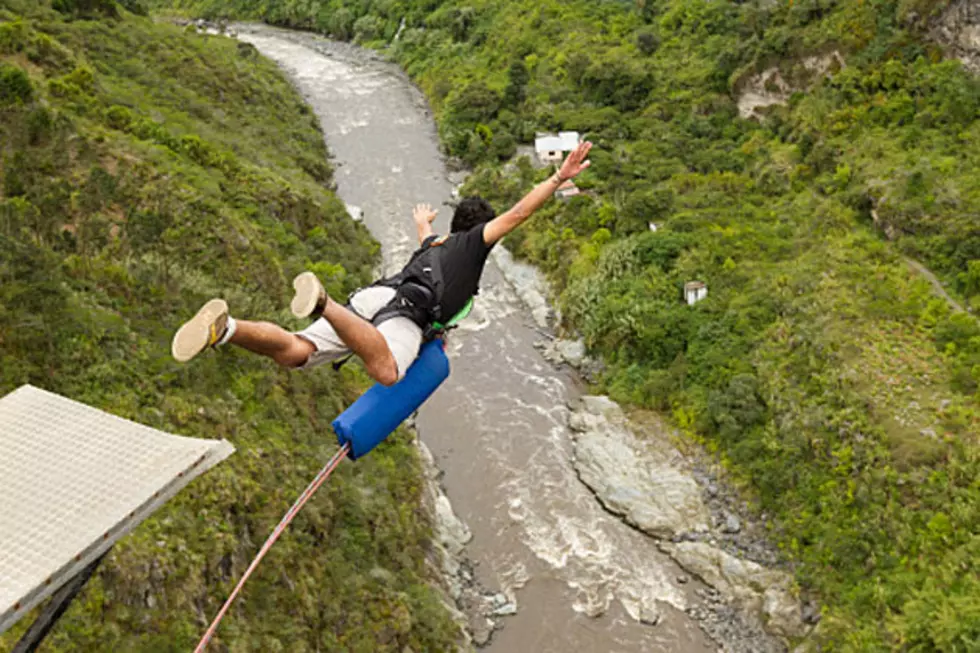 Woman Wears No Harness During Dangerous Bungee Jumping Stunt [VIDEO]