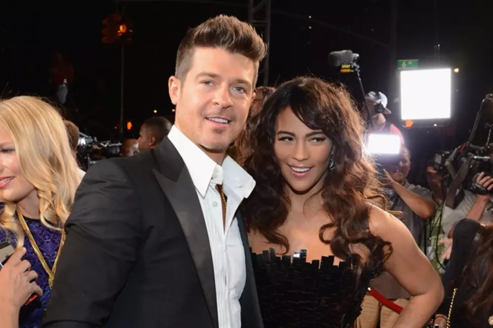 Mystery Woman Responds to Robin Thicke Butt-Grabbing Photo Scandal