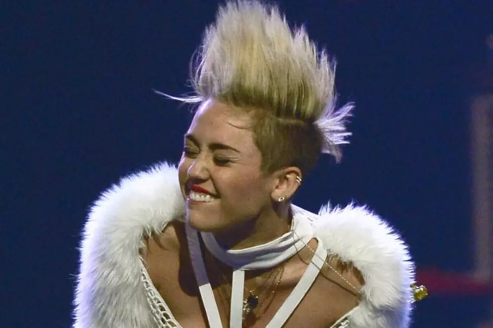 Miley Cyrus Gets &#8216;Rolling $tone&#8217; Tattooed on the Bottom of Her Feet [PHOTOS]