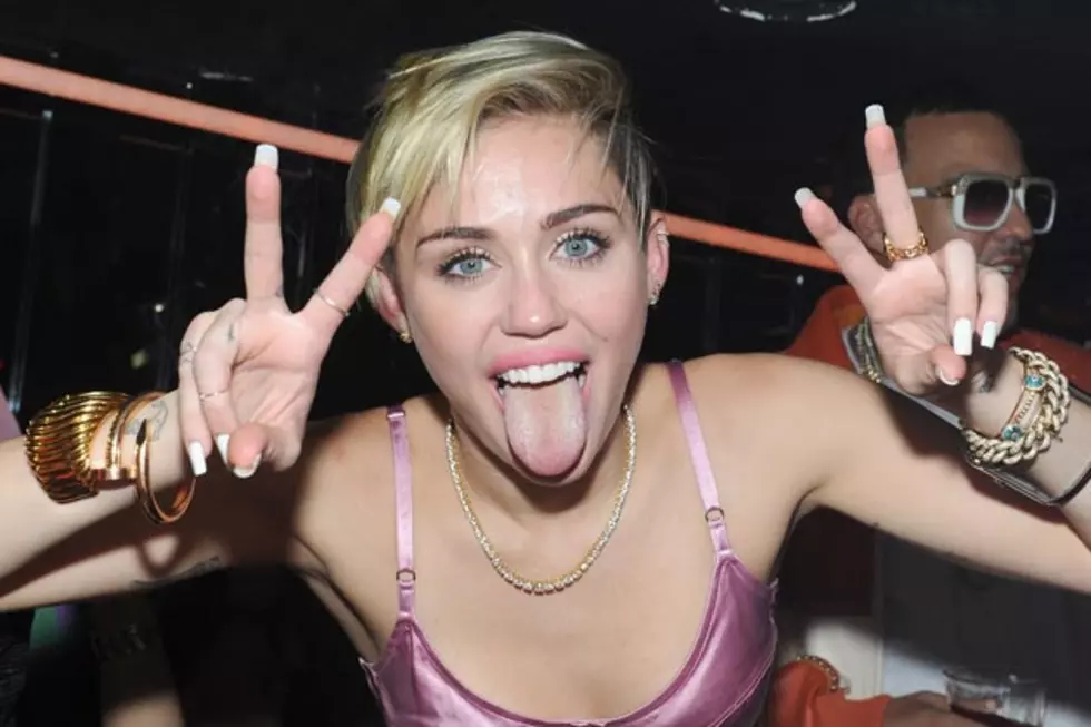 Miley Cyrus Wears a Pink Satin Bra to ‘Bangerz’ Record Release Party [PHOTOS]