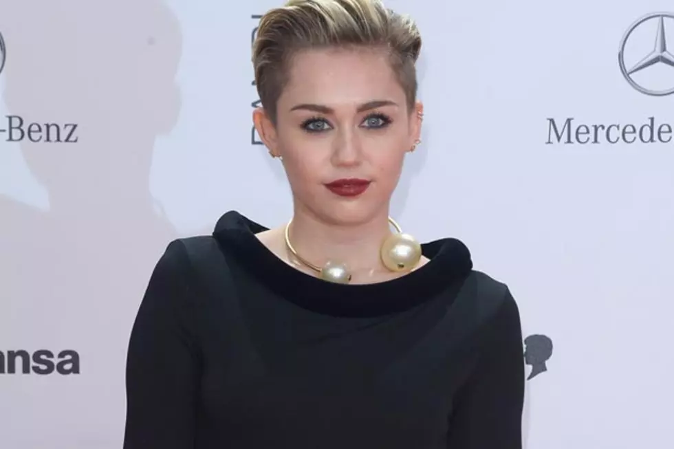 Miley Cyrus Covers Up at Bambi Awards [PHOTOS]