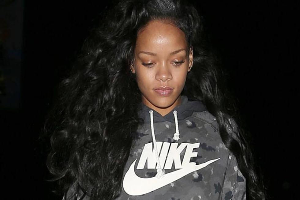 Rihanna Smokes Something Suspicious, Flashes Gold Tooth in NYC [PHOTOS]