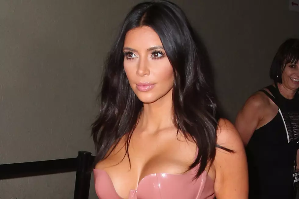 Kim Kardashian Demonstrates How to Balance a Champagne Glass on Your Butt [VIDEO]