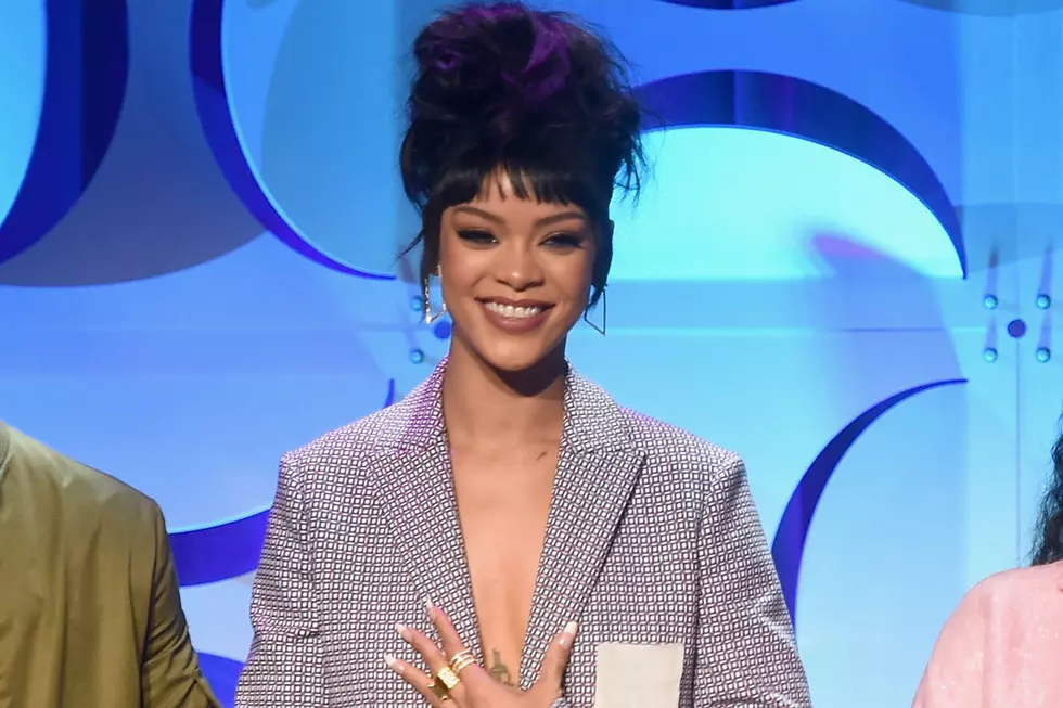 Rihanna Throws Wad of Cash at BET President in 'Staged' Video Promo