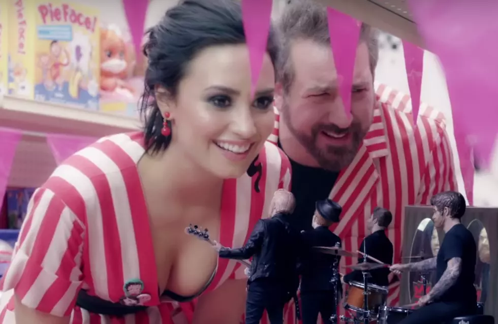 Demi Lovato and ‘NSYNC Members Toy With Fall Out Boy in ‘Irresistible’ Video