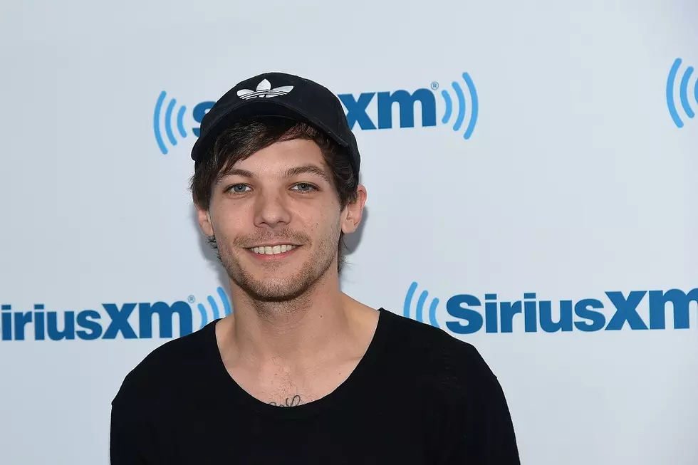 Louis Tomlinson Reportedly Arrested For Assaulting Paparazzo: Read His Team’s Statement